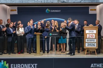 CEO of CAPITAL MARITIME FINANCE CORP. rings bell to celebrate listing on Euronext Athens
